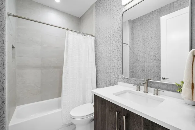 an aerial view of houses with yard