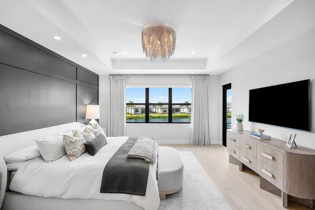 a view of a hallway with paintings on the wall