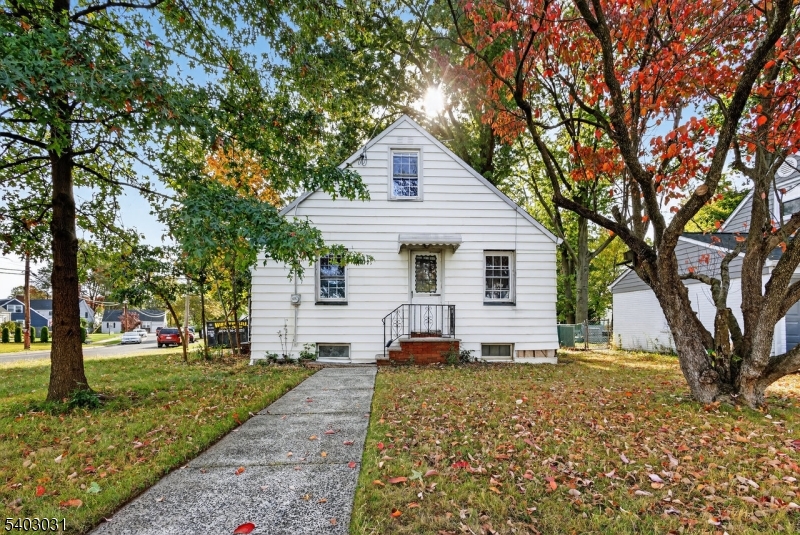 400 Douglas Road Roselle, NJ 07203 - Photo 2 of 16 a view of a house with a yard