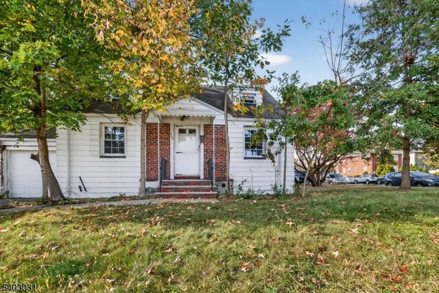 a front view of house with yard