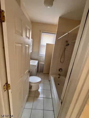 a bathroom with a sink and toilet