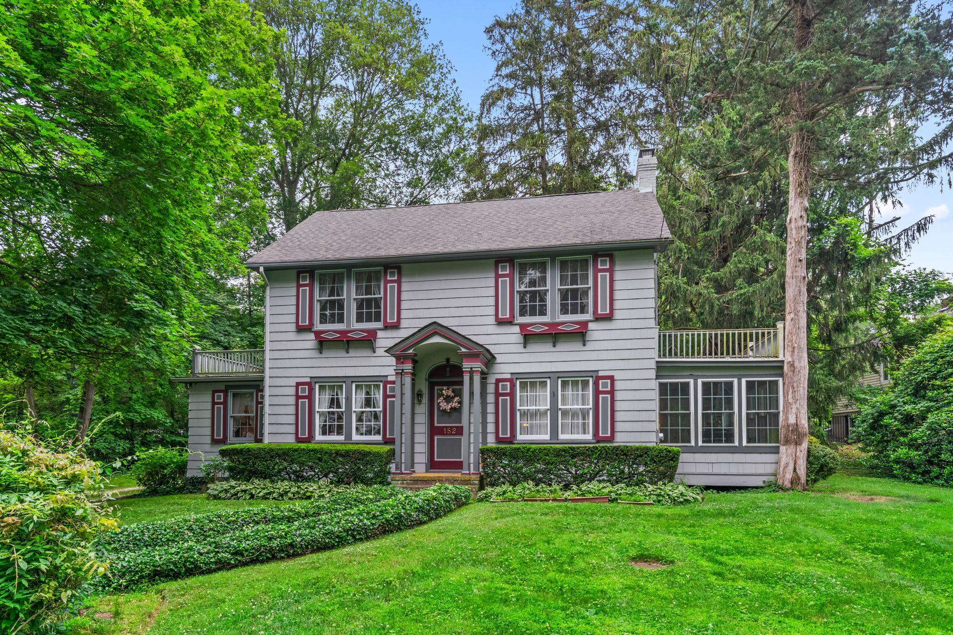front view of a house with a yard