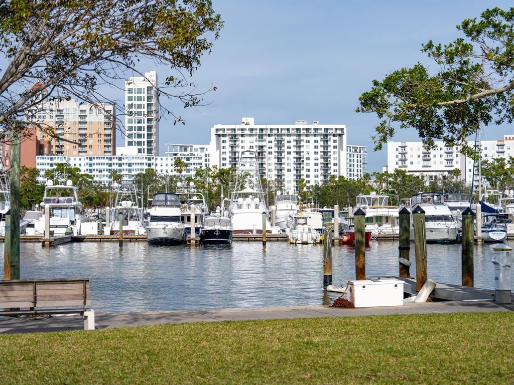 101 South Gulfstream Avenue, Unit 10E Sarasota, FL 34236 - Photo 51 of 54 a swimming pool view with a outdoor seating
