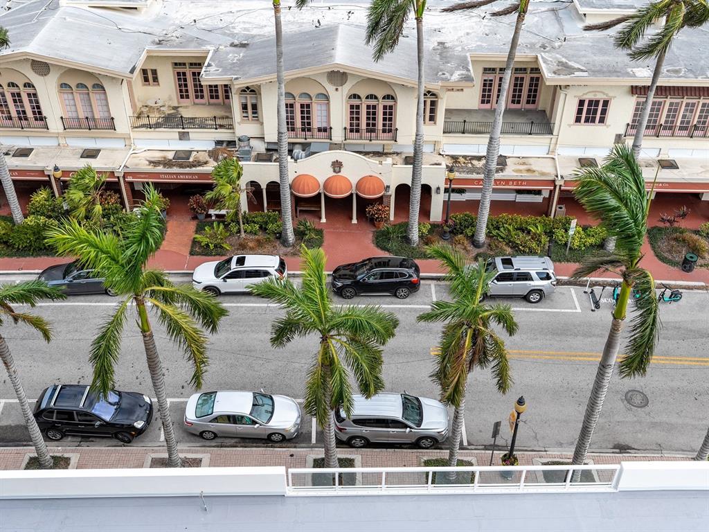 101 South Gulfstream Avenue, Unit 10E Sarasota, FL 34236 - Photo 8 of 54 a view of a swimming pool with outdoor seating