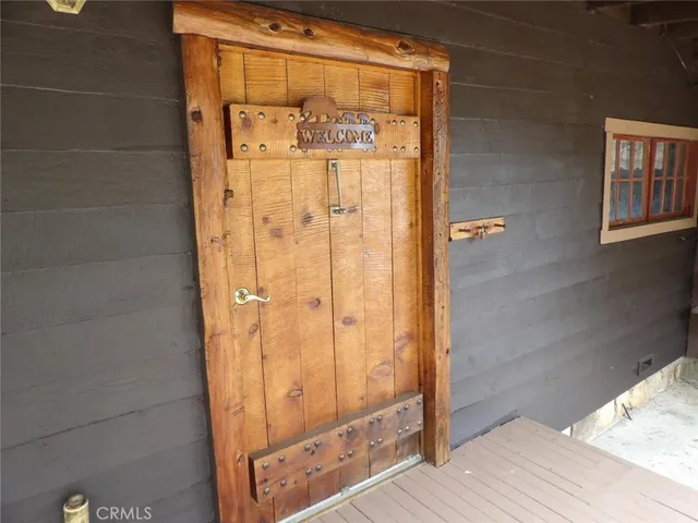 a black and white stove top oven sitting inside of a kitchen