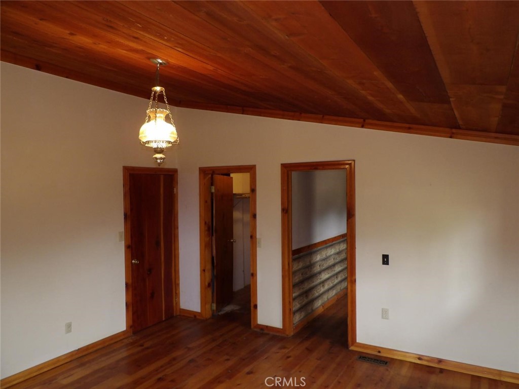 44001 Dunlap Road Miramonte, CA 93641 - Photo 24 of 75 a view of an empty room with wooden floor