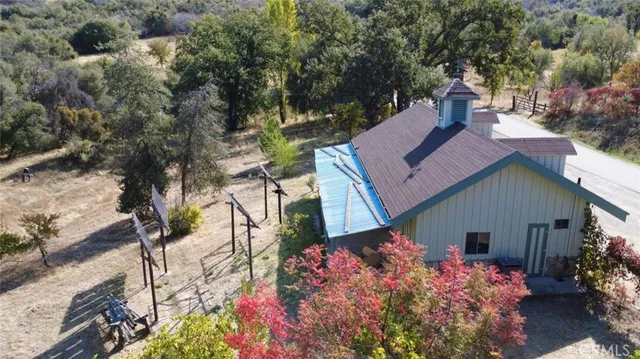 a kitchen with a refrigerator and a sink