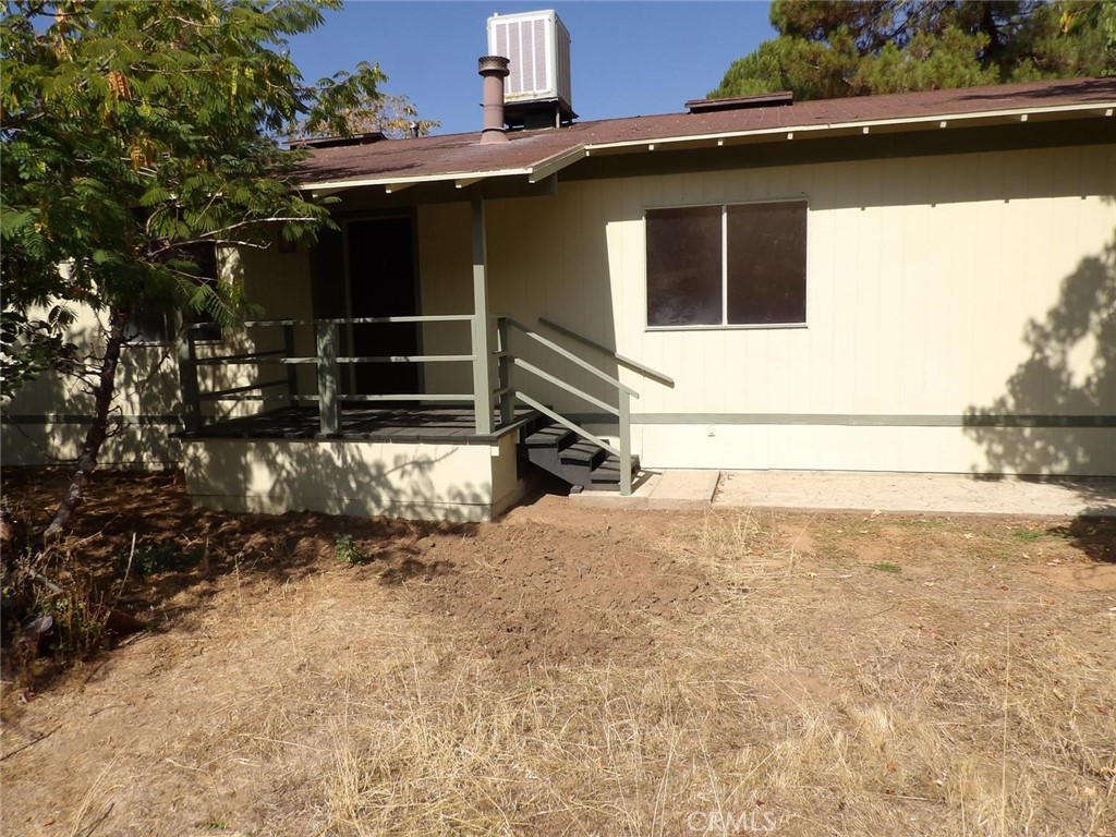 44001 Dunlap Road Miramonte, CA 93641 - Photo 34 of 75 a view of backyard with wooden deck and seating space