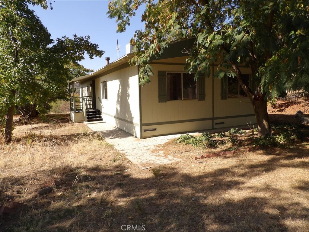 44001 Dunlap Road Miramonte, CA 93641 - Photo 35 of 75 a view of a house with a yard
