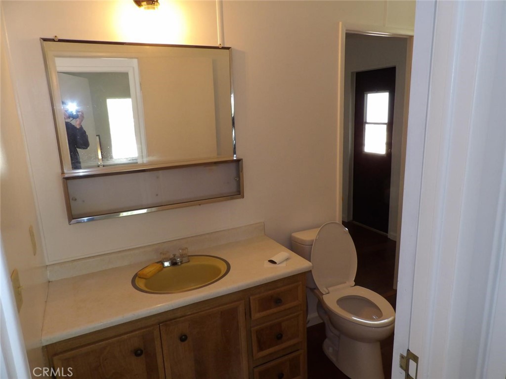 44001 Dunlap Road Miramonte, CA 93641 - Photo 44 of 75 a bathroom with a sink and a toilet