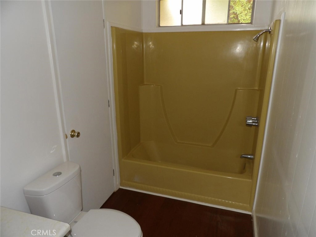 44001 Dunlap Road Miramonte, CA 93641 - Photo 45 of 75 a bathroom with a toilet and shower