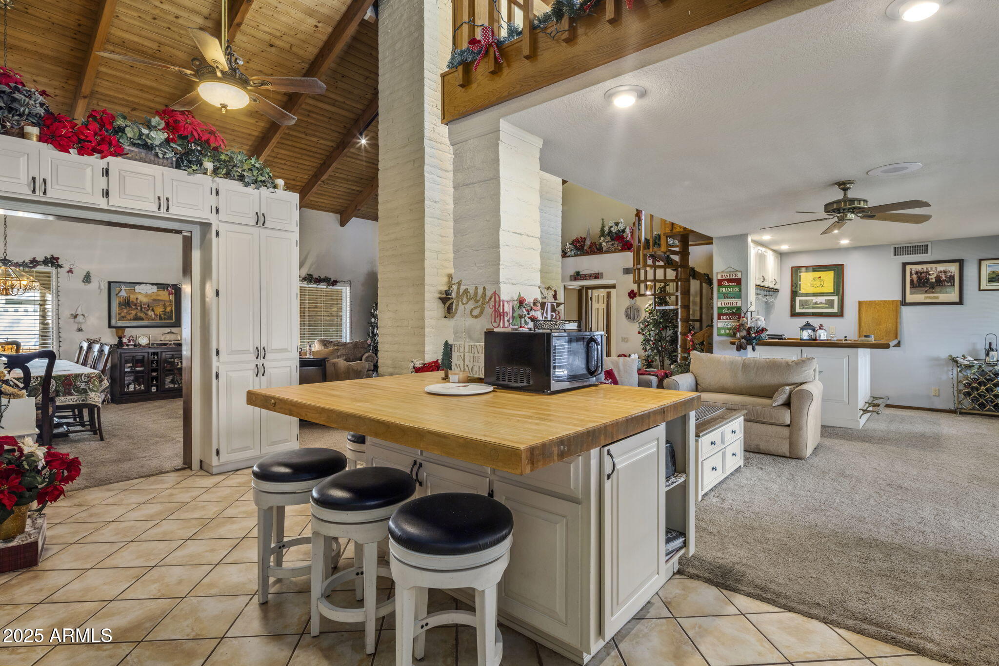 5555 East Turquoise Avenue Paradise Valley, AZ 85253 - Photo 11 of 36 a room with furniture a dining table and chairs