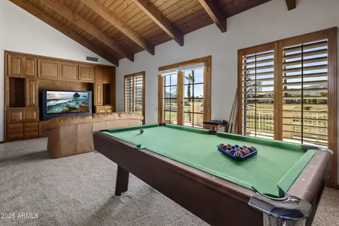 a view of a building with sitting area