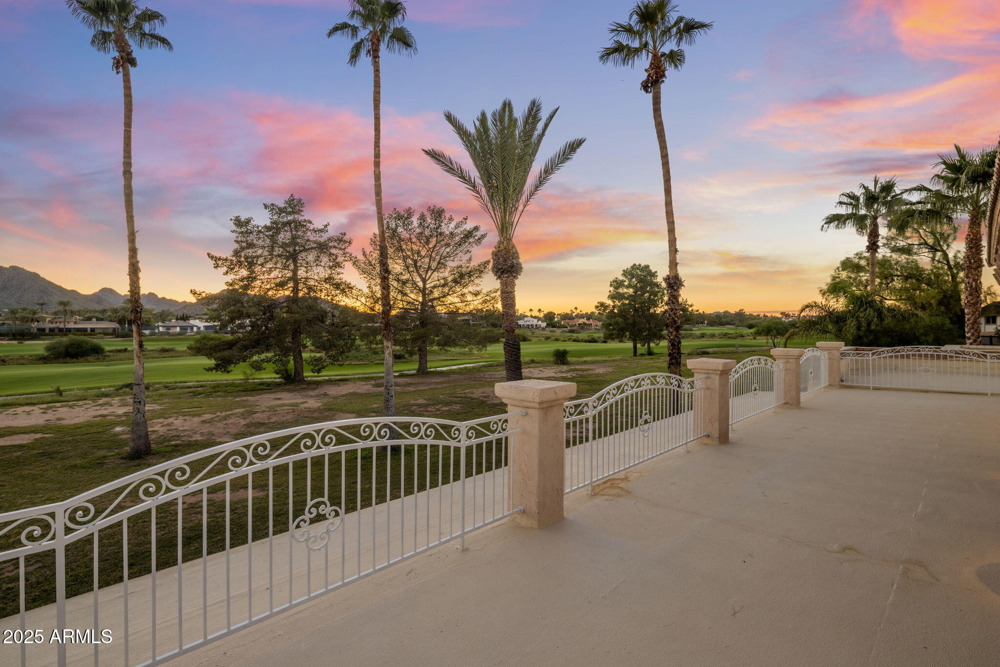 5555 East Turquoise Avenue Paradise Valley, AZ 85253 - Photo 16 of 36 a view of a house with a roof deck