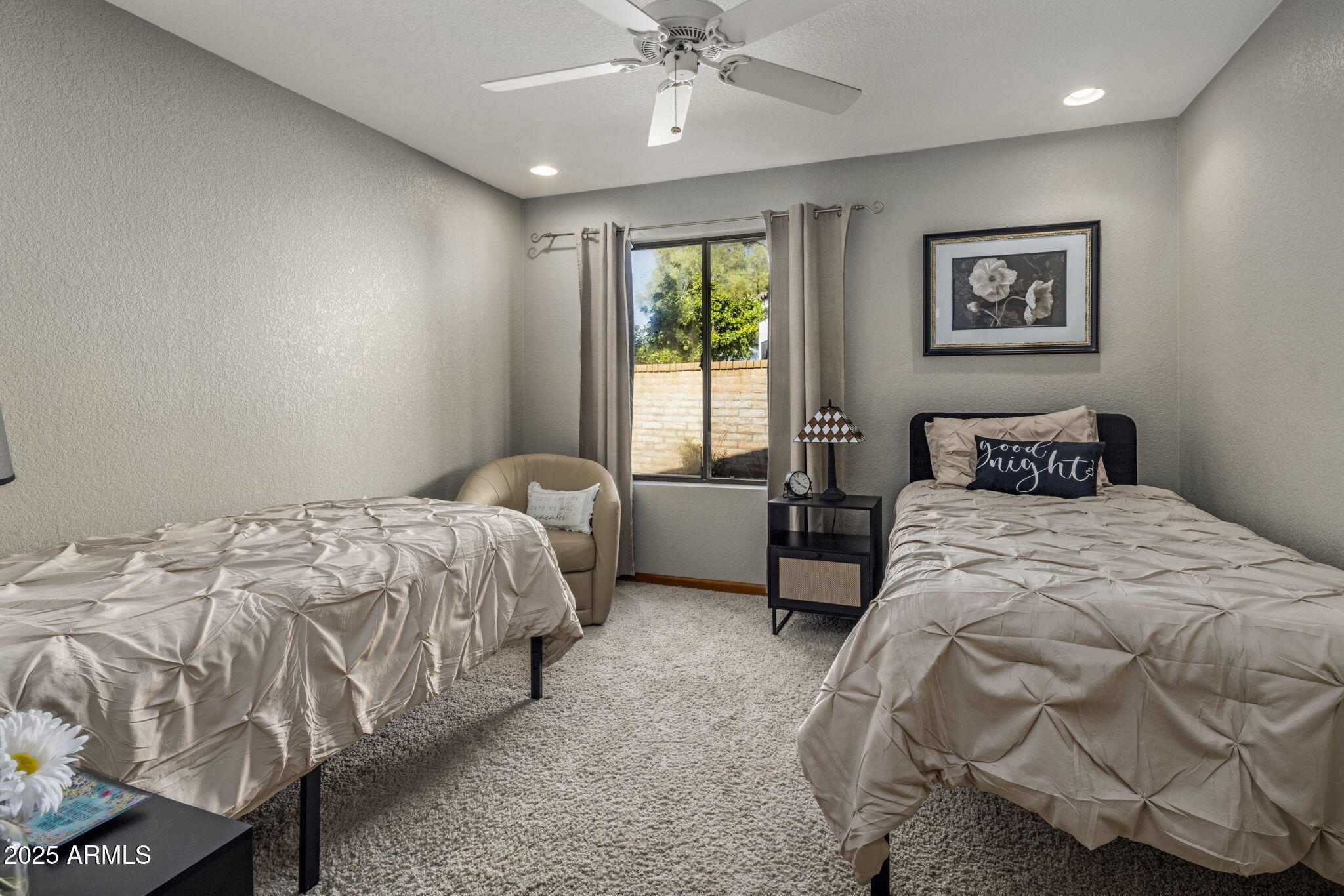 5555 East Turquoise Avenue Paradise Valley, AZ 85253 - Photo 22 of 36 a bedroom with a bed and a window