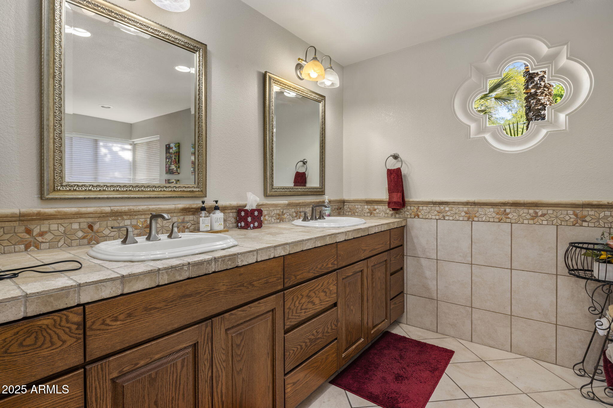 5555 East Turquoise Avenue Paradise Valley, AZ 85253 - Photo 30 of 47 a bathroom with a sink and a mirror