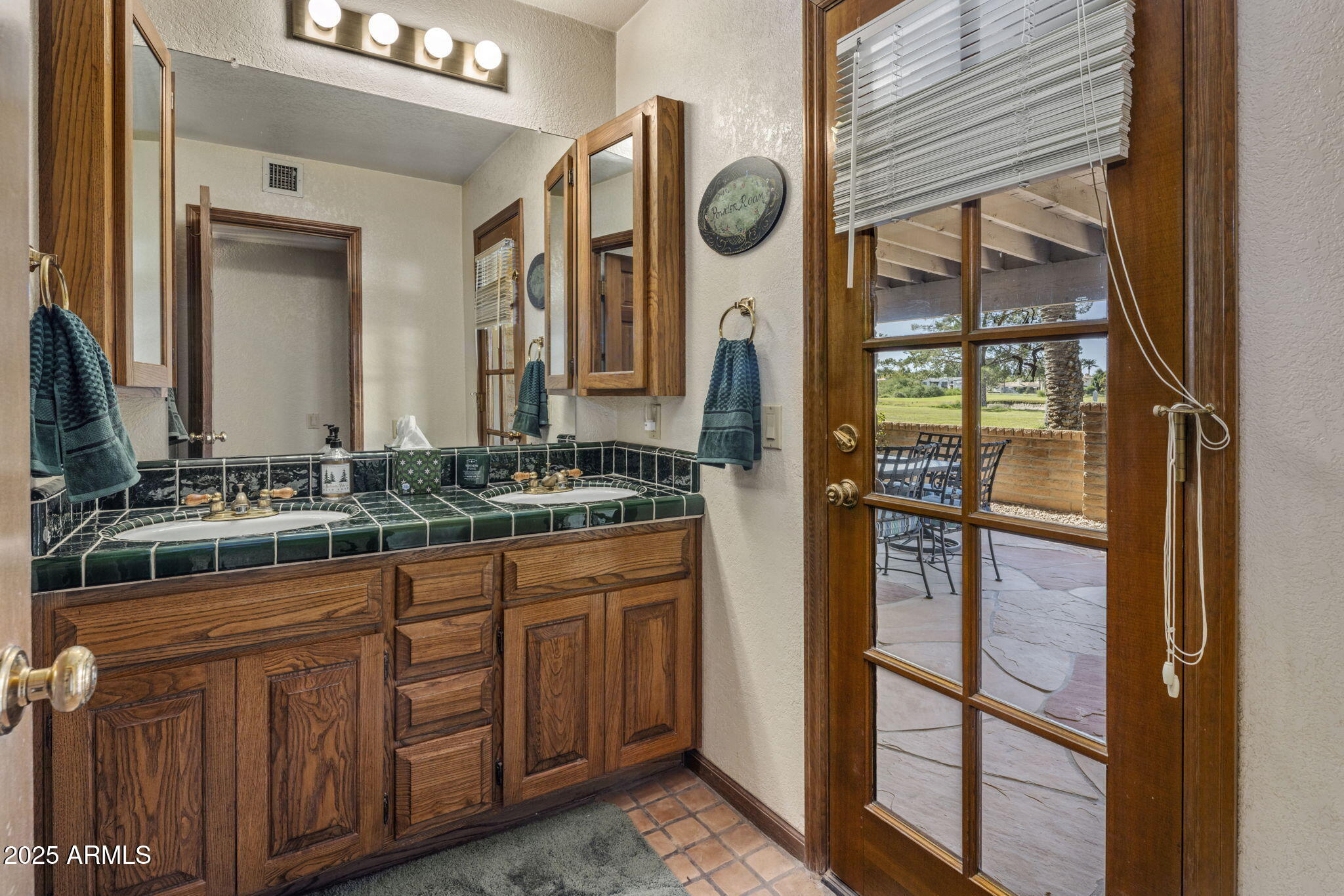 5555 East Turquoise Avenue Paradise Valley, AZ 85253 - Photo 38 of 47 a bathroom with a sink and a mirror