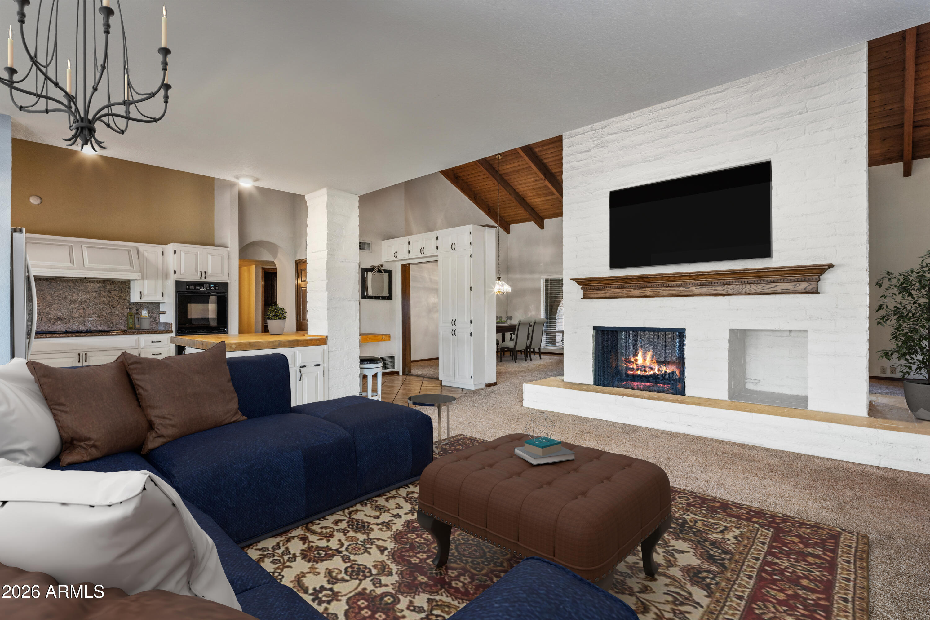 5555 East Turquoise Avenue Paradise Valley, AZ 85253 - Photo 9 of 47 a living room with furniture and a fireplace