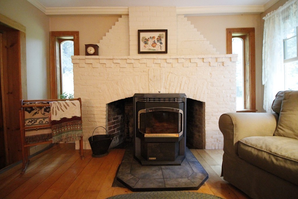 10 Judd Road Heath, MA 01339 - Photo 14 of 26 a living room with furniture and a fireplace