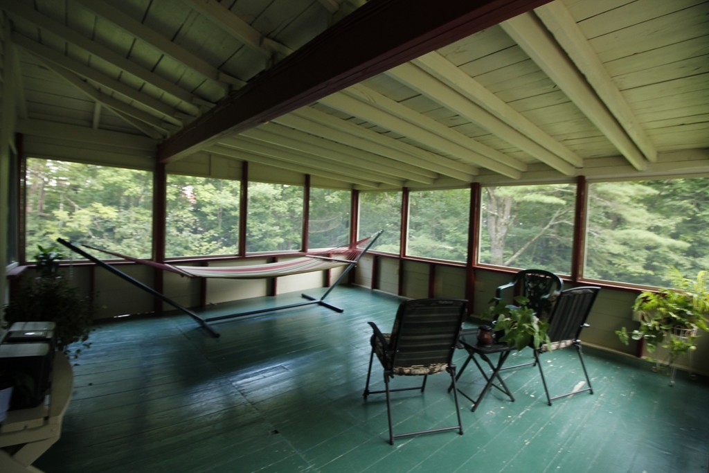 10 Judd Road Heath, MA 01339 - Photo 16 of 26 a living room with furniture and a floor to ceiling window