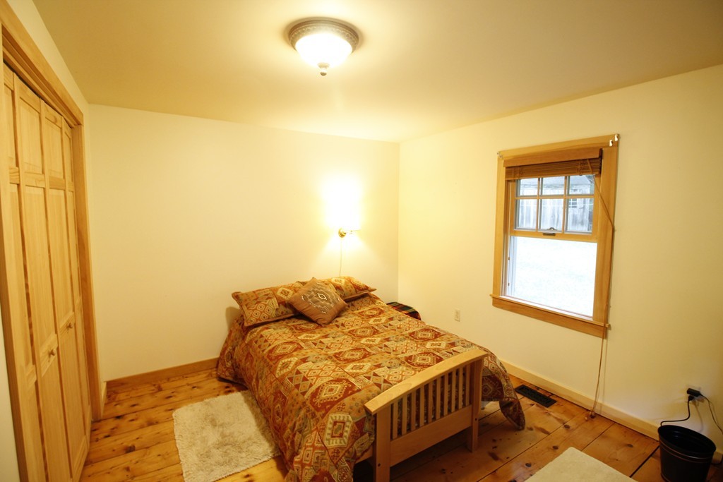 10 Judd Road Heath, MA 01339 - Photo 17 of 26 a bedroom with a bed and a window