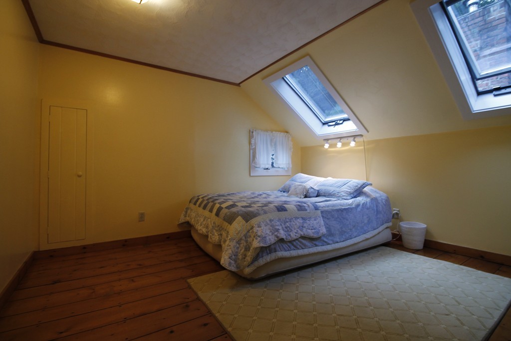10 Judd Road Heath, MA 01339 - Photo 22 of 26 a spacious bedroom with a bed and wooden floor