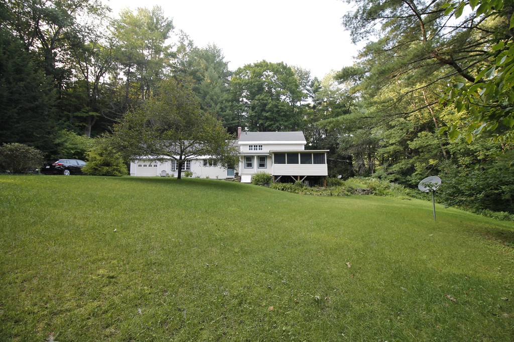 10 Judd Road Heath, MA 01339 - Photo 4 of 26 a view of a house with a big yard and large trees