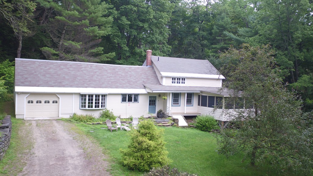 10 Judd Road Heath, MA 01339 - Photo 5 of 26 a aerial view of a house with yard and trees in the background