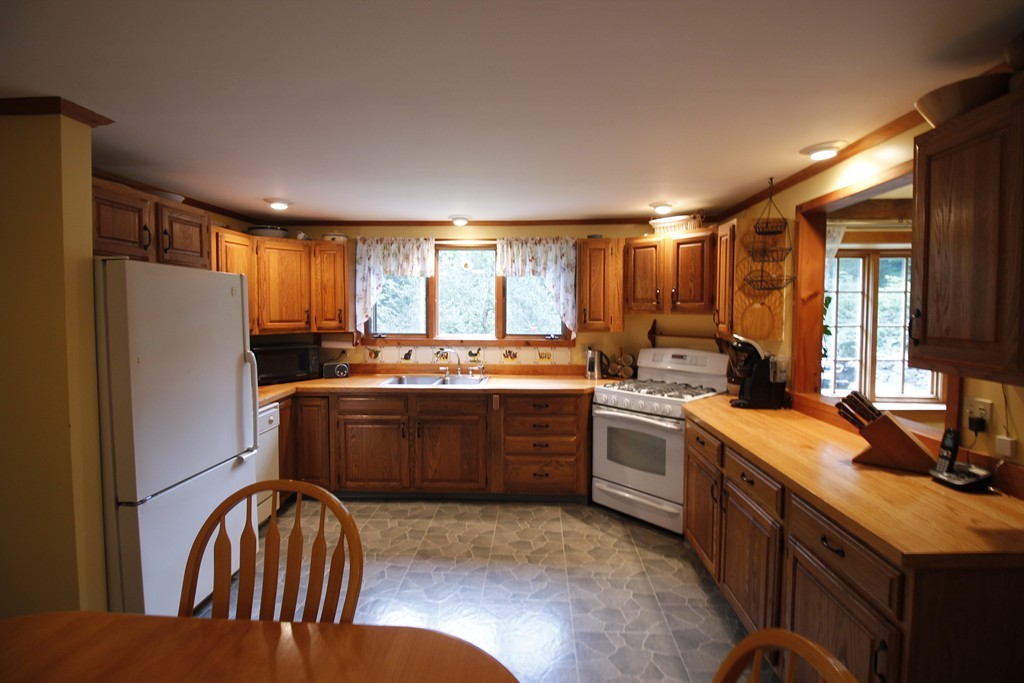 10 Judd Road Heath, MA 01339 - Photo 6 of 26 a kitchen with a refrigerator sink and stove