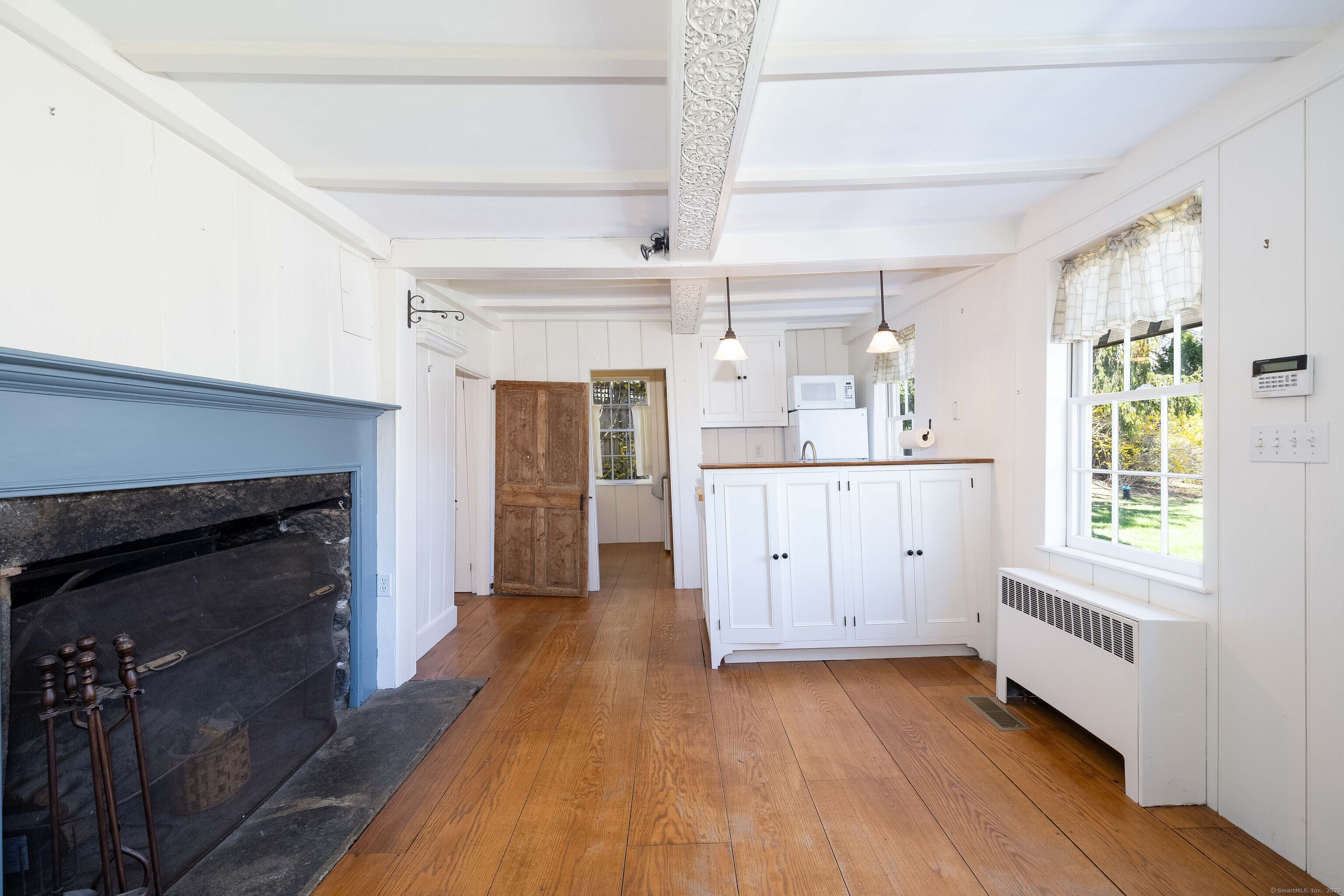 180 Green Hill Road Killingworth, CT 06419 - Photo 14 of 39 a kitchen with a sink and wooden floor