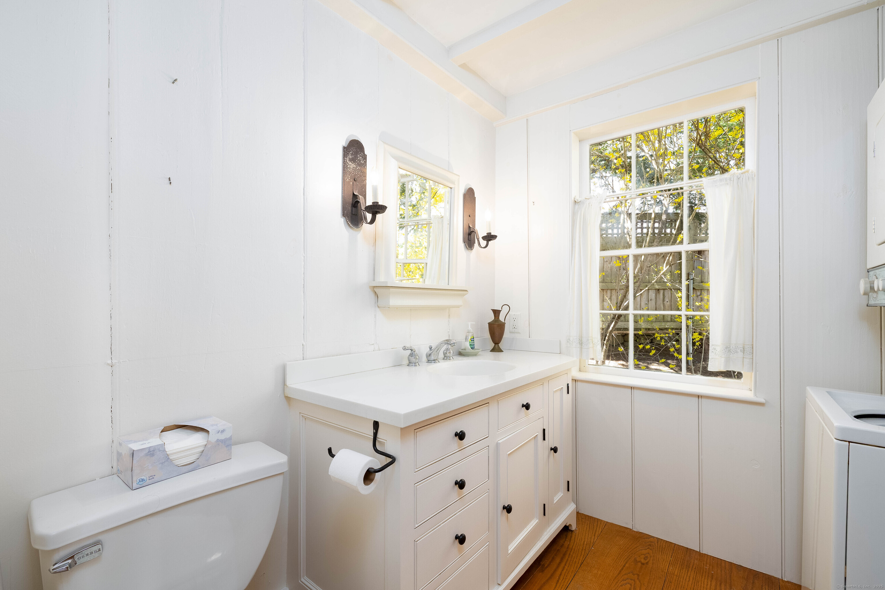 180 Green Hill Road Killingworth, CT 06419 - Photo 16 of 39 a bathroom with a sink toilet vanity and window