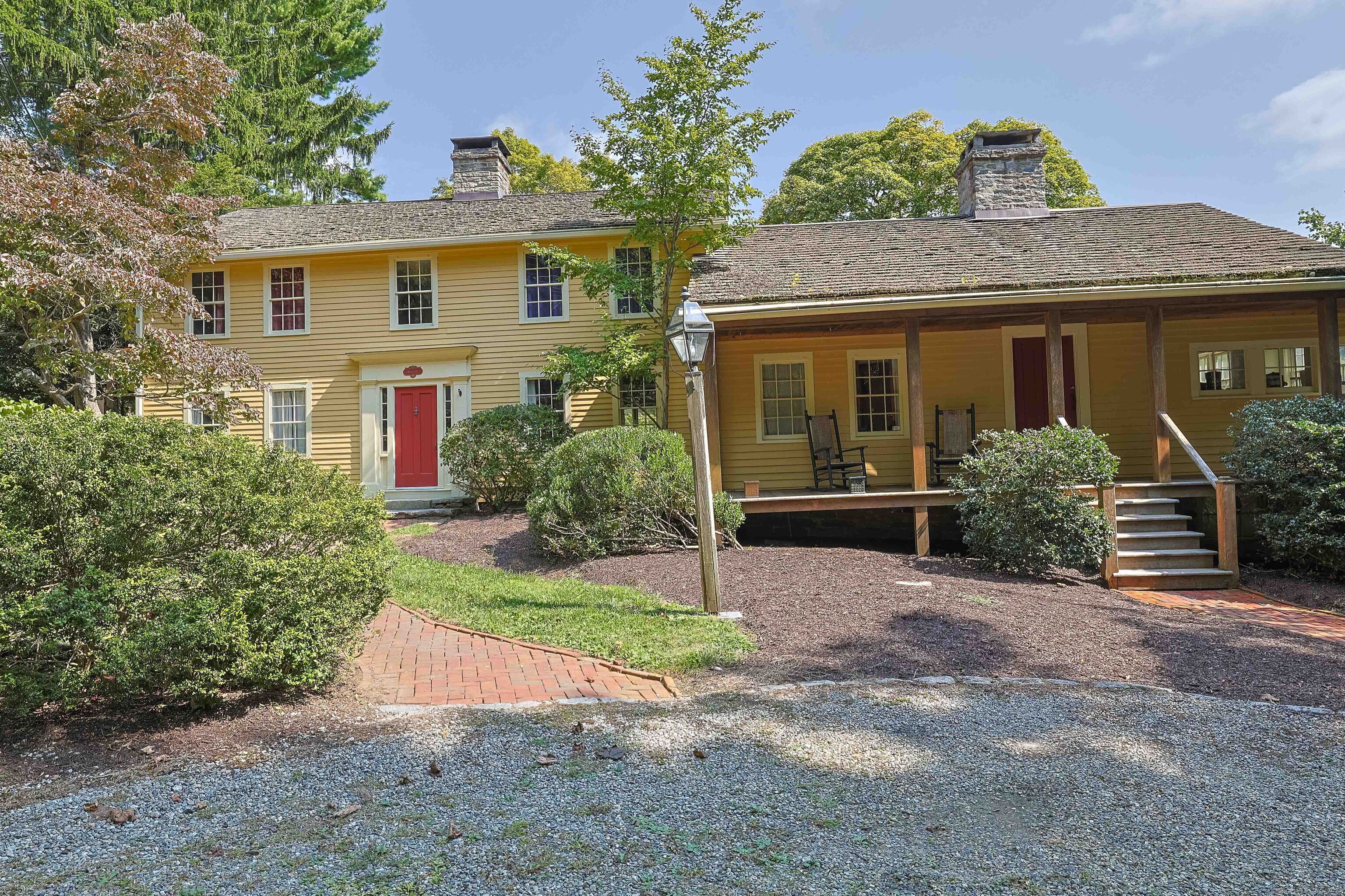 180 Green Hill Road Killingworth, CT 06419 - Photo 2 of 39 front view of a house with a garden
