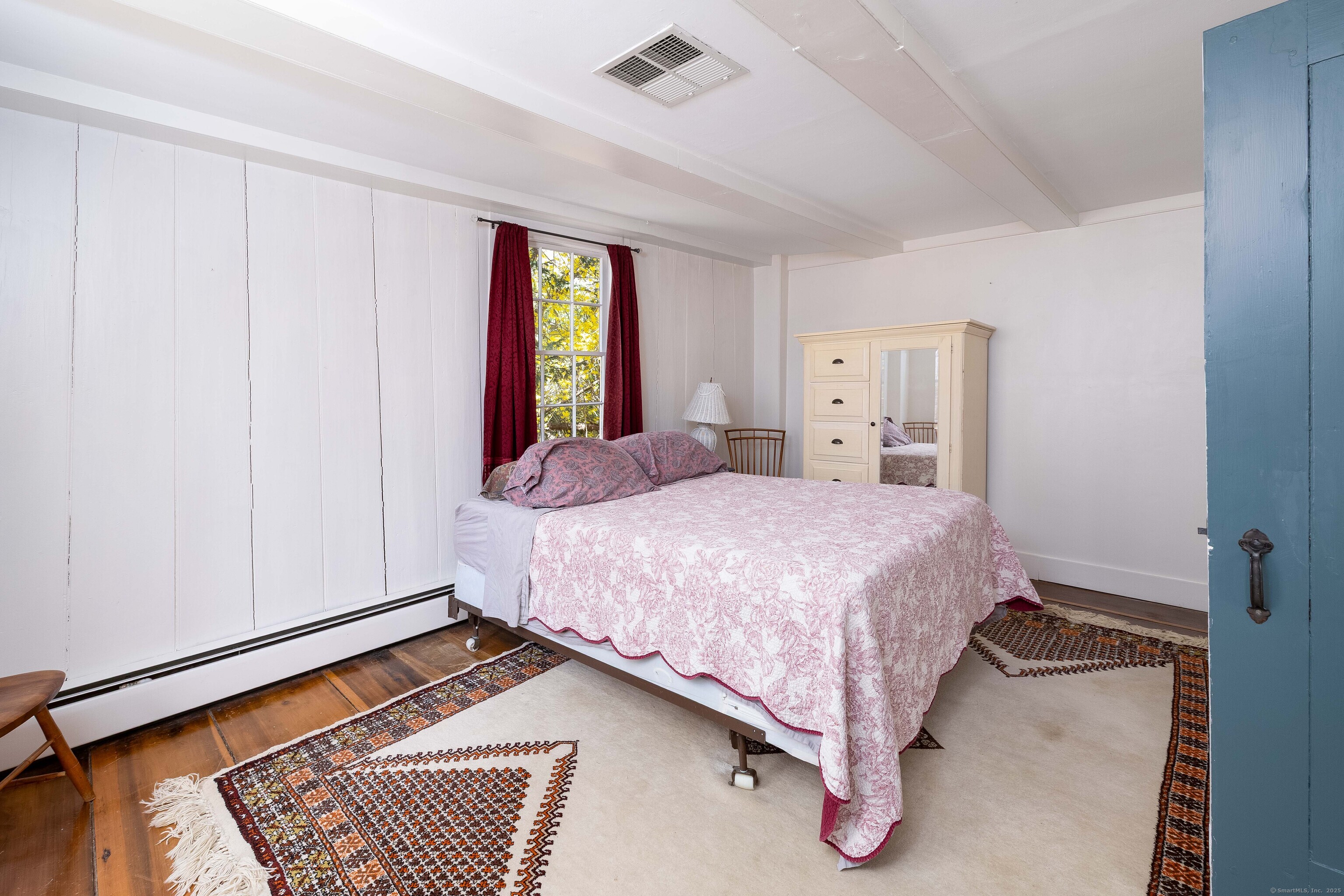 180 Green Hill Road Killingworth, CT 06419 - Photo 21 of 39 a spacious bedroom with a bed and window