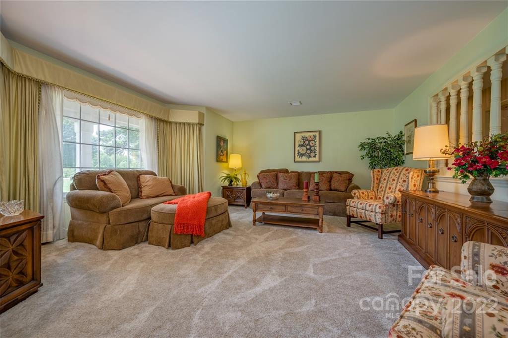 761 Poors Ford Road Rutherfordton, NC 28139 - Photo 11 of 48 a living room with furniture and flowers