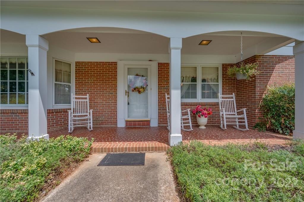 761 Poors Ford Road Rutherfordton, NC 28139 - Photo 6 of 48 a view of a house with a small yard and plants