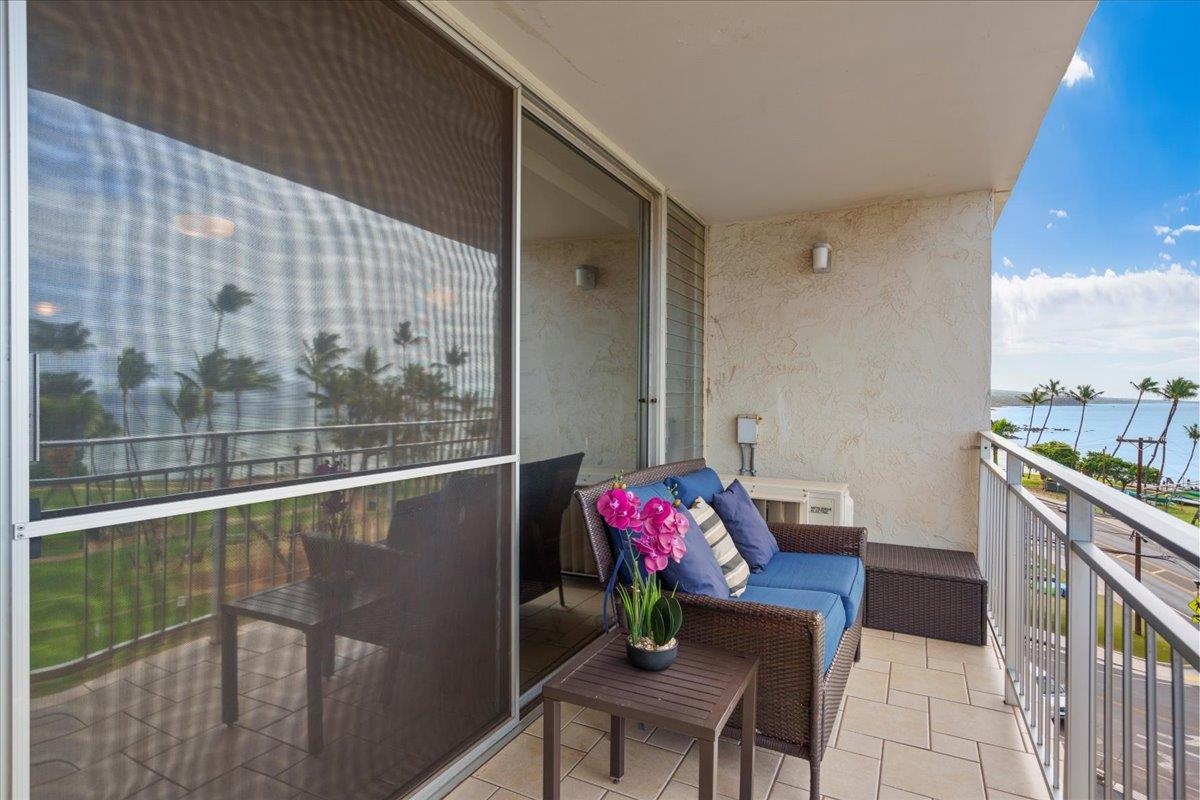 1993 South Kihei Road, Unit 601 Kihei, HI 96753 - Photo 24 of 45 a balcony with furniture and flowers