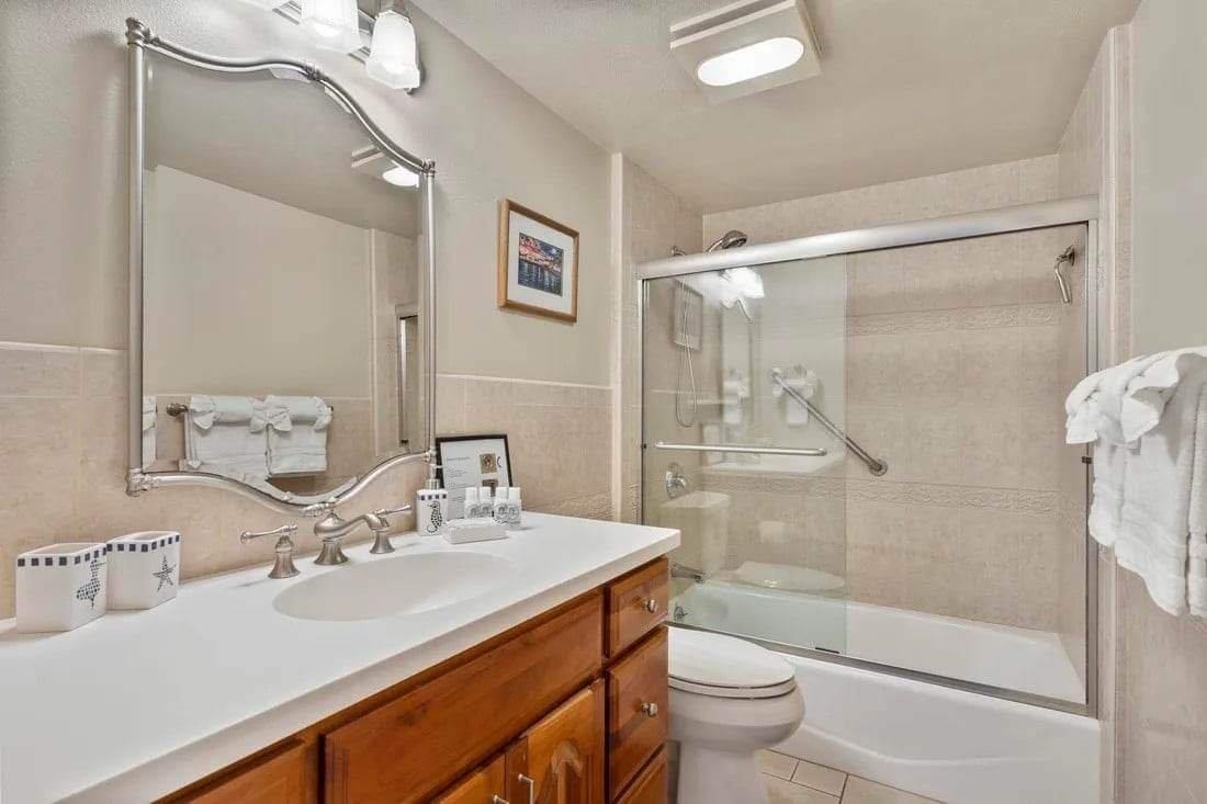 1993 South Kihei Road, Unit 601 Kihei, HI 96753 - Photo 40 of 45 a bathroom with a sink and a mirror
