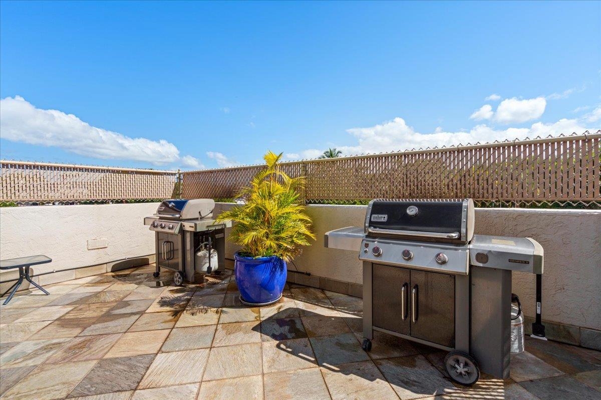 1993 South Kihei Road, Unit 601 Kihei, HI 96753 - Photo 44 of 45 a view of a chairs and table on the terrace