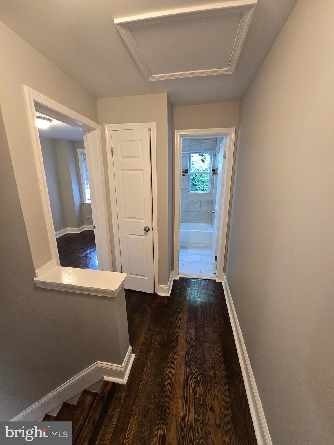 144 Chestnut Street Baltimore, MD 21222 - Photo 8 of 14 wooden floor in an empty room