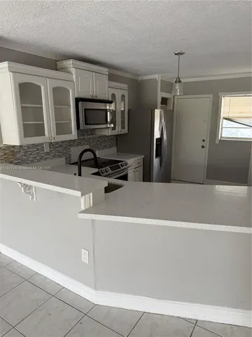 a view of a livingroom with a window