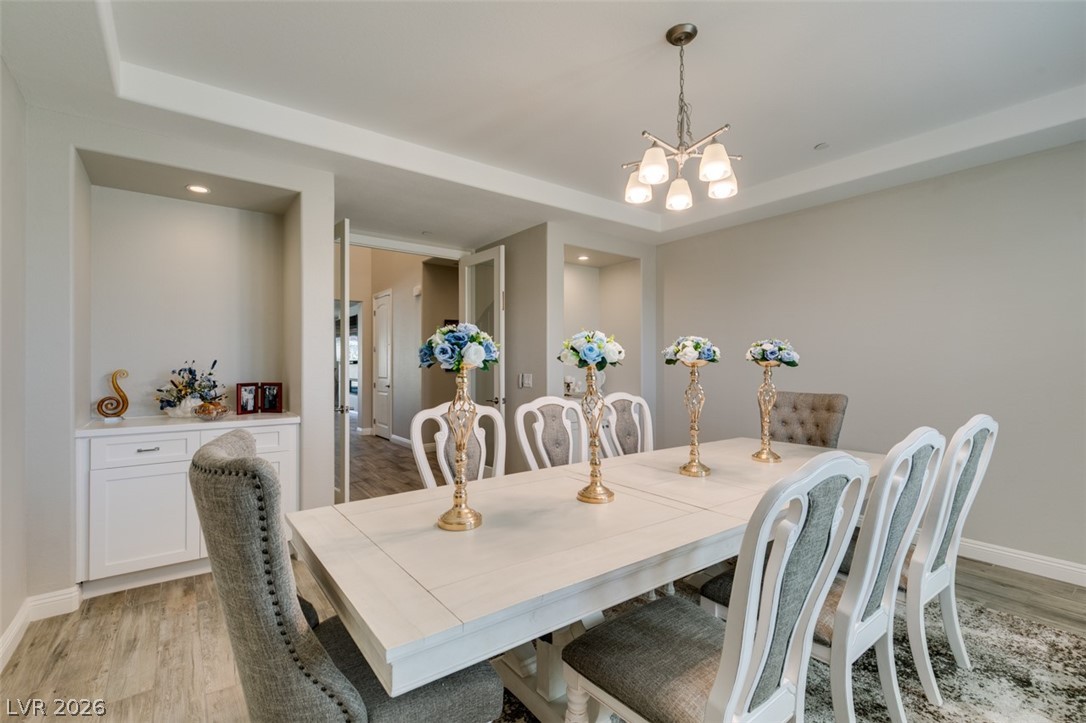 8615 Jerlyn Street Las Vegas, NV 89113 - Photo 19 of 76 Formal dining room with double door entry