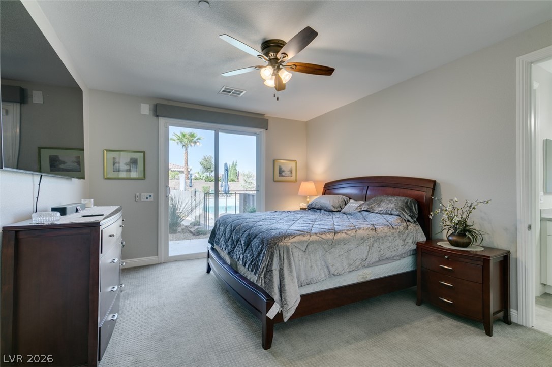 8615 Jerlyn Street Las Vegas, NV 89113 - Photo 25 of 76 Downstairs bedroom with bathroom