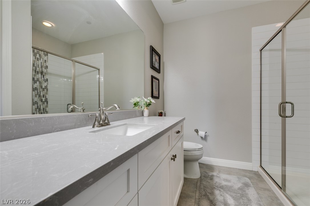 8615 Jerlyn Street Las Vegas, NV 89113 - Photo 26 of 76 Bathroom in downstairs bedroom on first floor