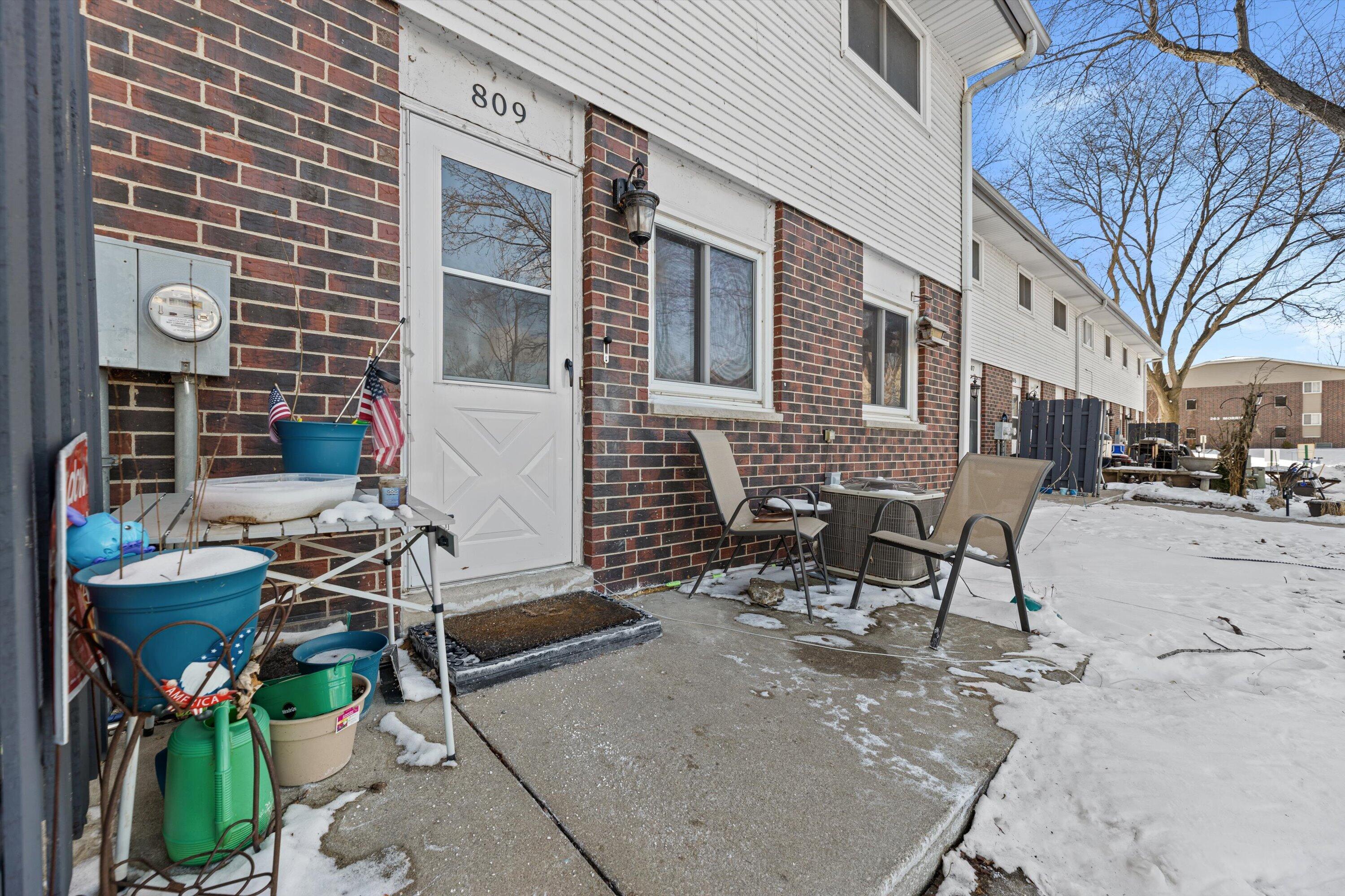 809 Ridgeway Drive Pewaukee, WI 53072 - Photo 33 of 41 Back Entrance