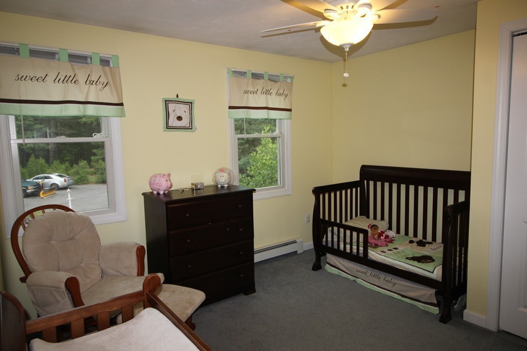 28 Hillside Road Rochester, MA 02770 - Photo 19 of 20 a bedroom with a bed and window