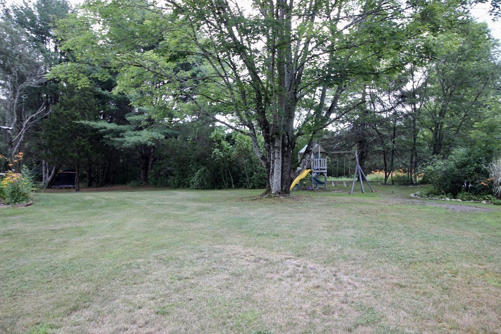 28 Hillside Road Rochester, MA 02770 - Photo 4 of 20 a view of outdoor space with trees