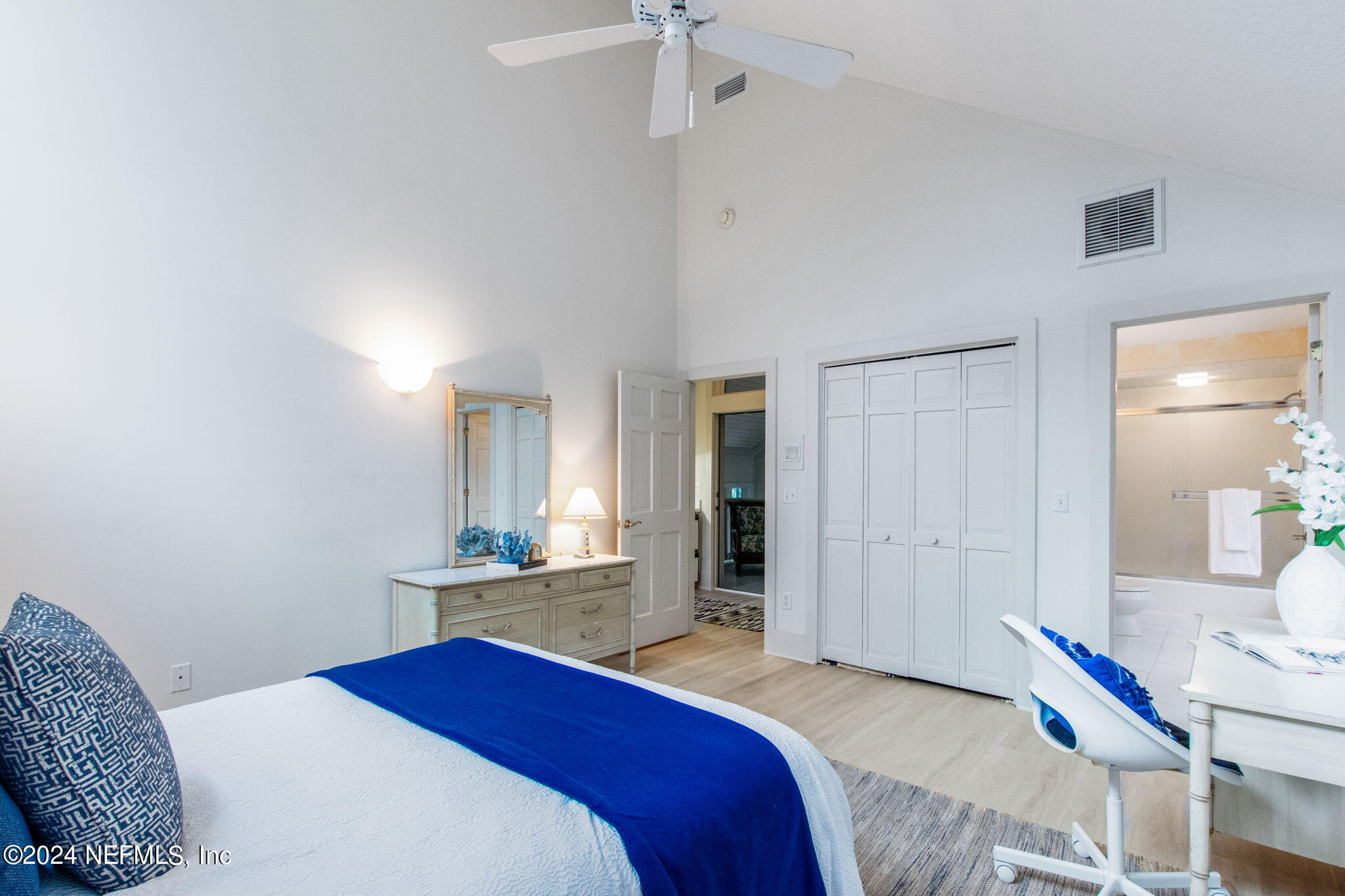 43 Sea Marsh Road Fernandina Beach, FL 32034 - Photo 60 of 111 a bedroom with a bed and a table in it