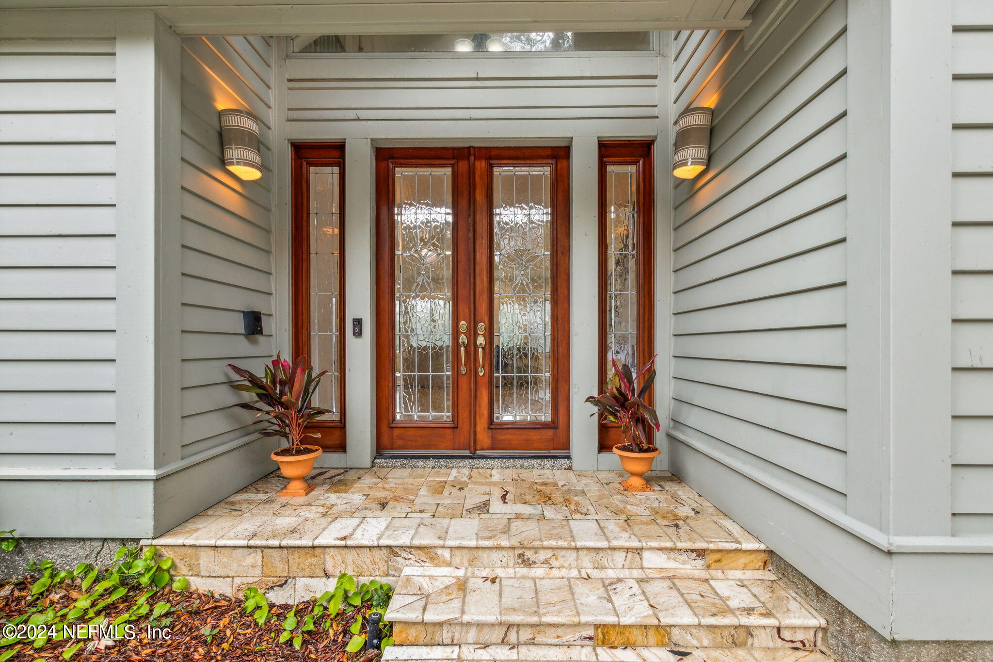 43 Sea Marsh Road Fernandina Beach, FL 32034 - Photo 7 of 111 a view of entrance door of the house