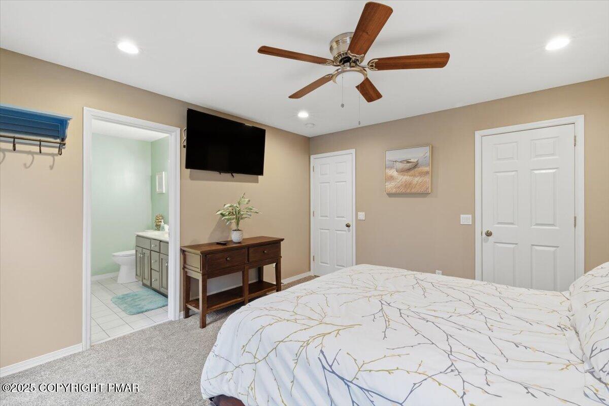 126 Snyder Lane Scotrun, PA 18355 - Photo 12 of 22 a bedroom with a bed and a flat screen tv