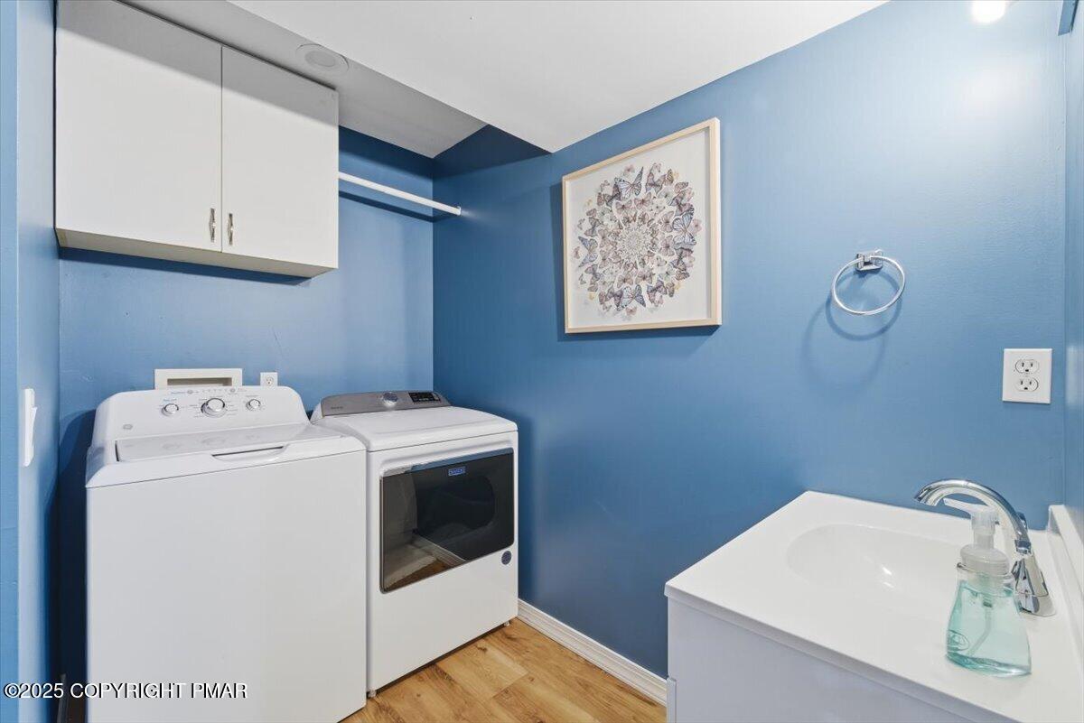126 Snyder Lane Scotrun, PA 18355 - Photo 19 of 22 a utility room with dryer and washer
